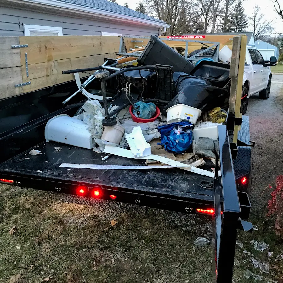 Roll-off dumpster delivered to a residential driveway in Winona