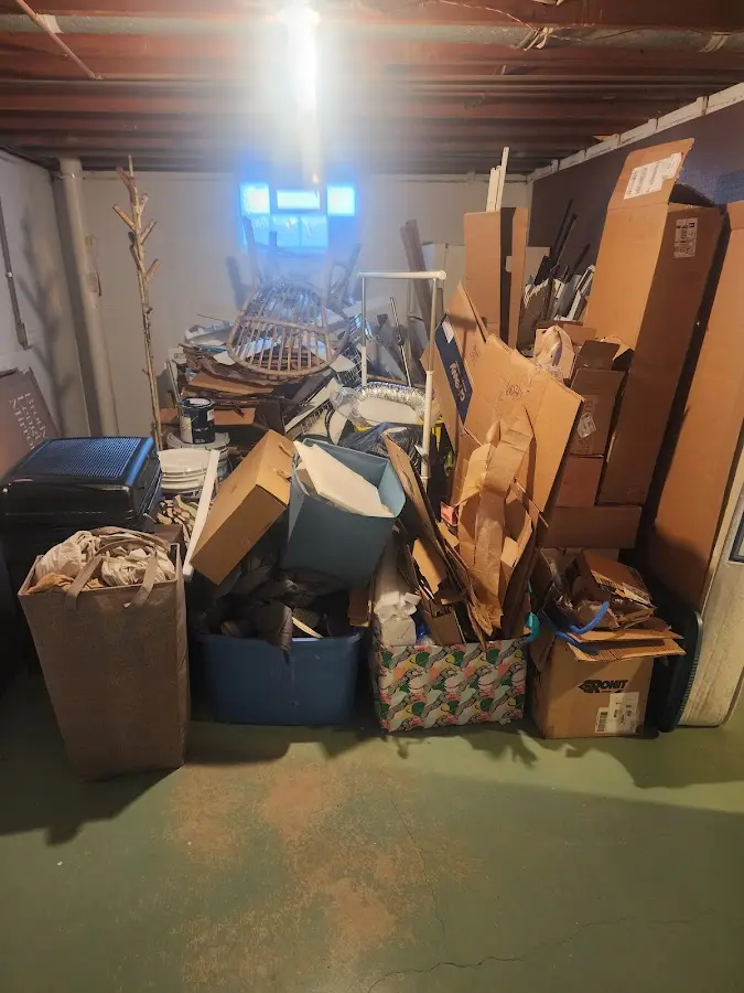 Roll-off dumpster container at job site for 4 Yard Dumpster Rental in Winona